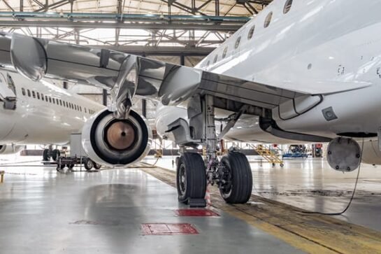 panoramic-view-aerospace-hangar-with-planes-MD